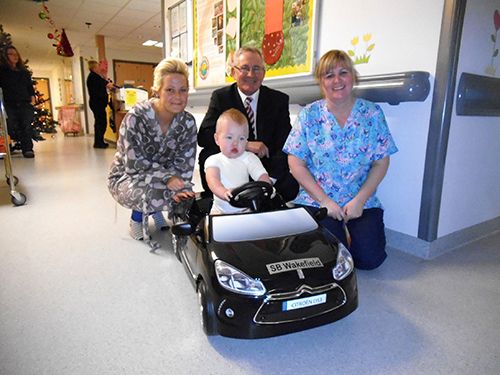 Young burns patients test drive new set of wheels